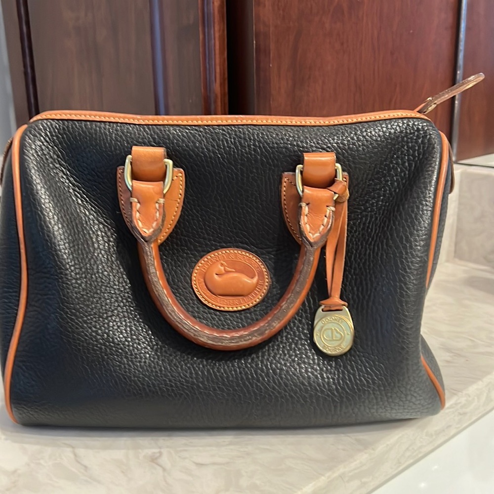 Vintage Dooley and Bourne in like new condition